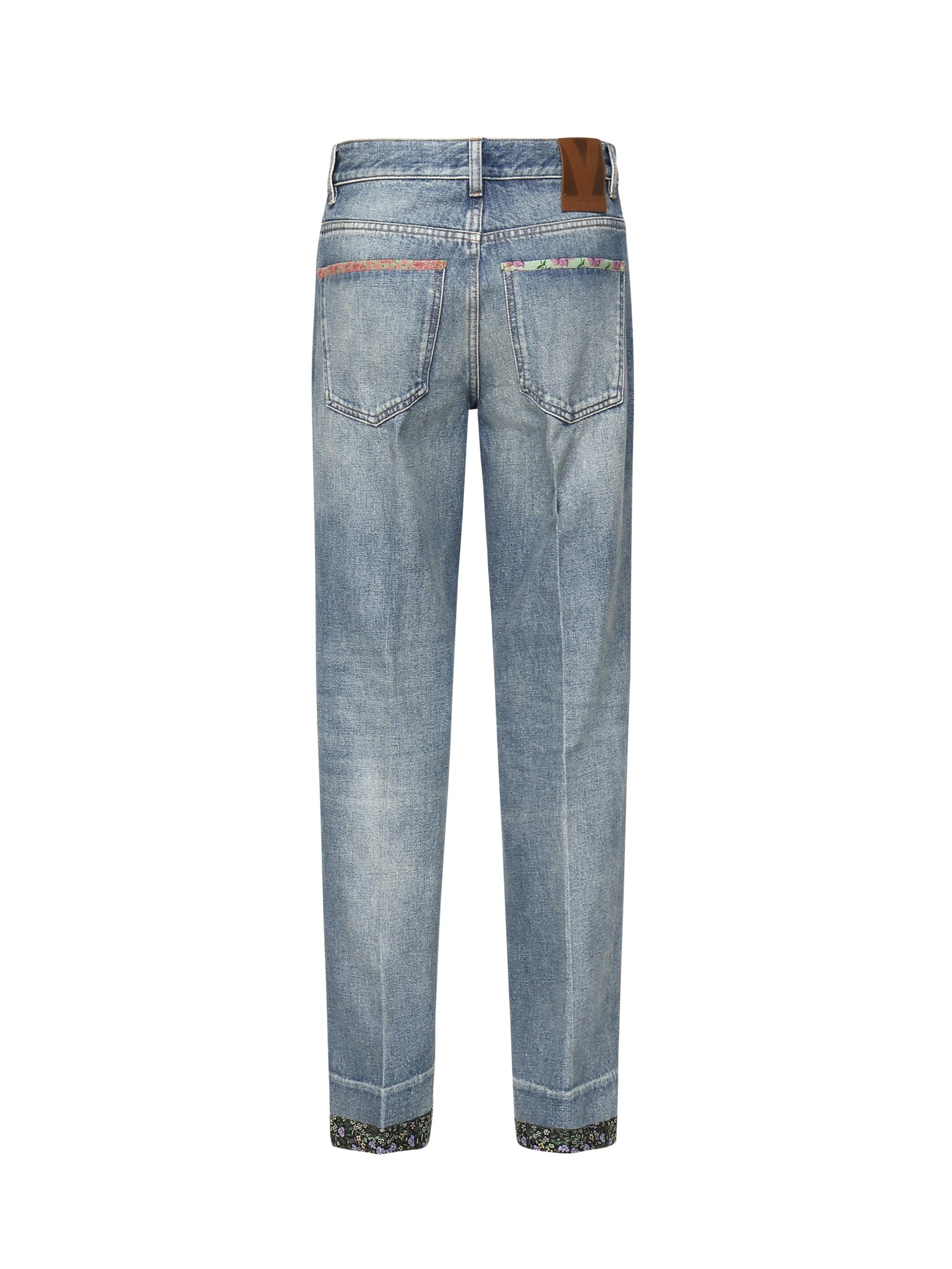Jeans in denim con bordi stampati 6B0DD19X 94V558 VALENTINO GARAVANI