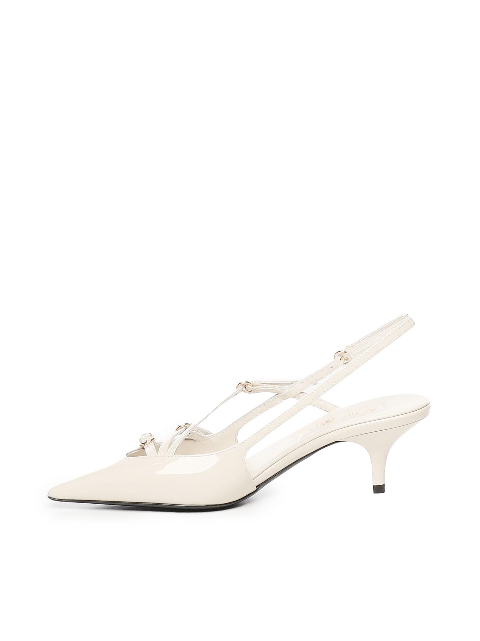Décolleté slingback in vernice con fibbie 5I013E 69F0304 MIU MIU