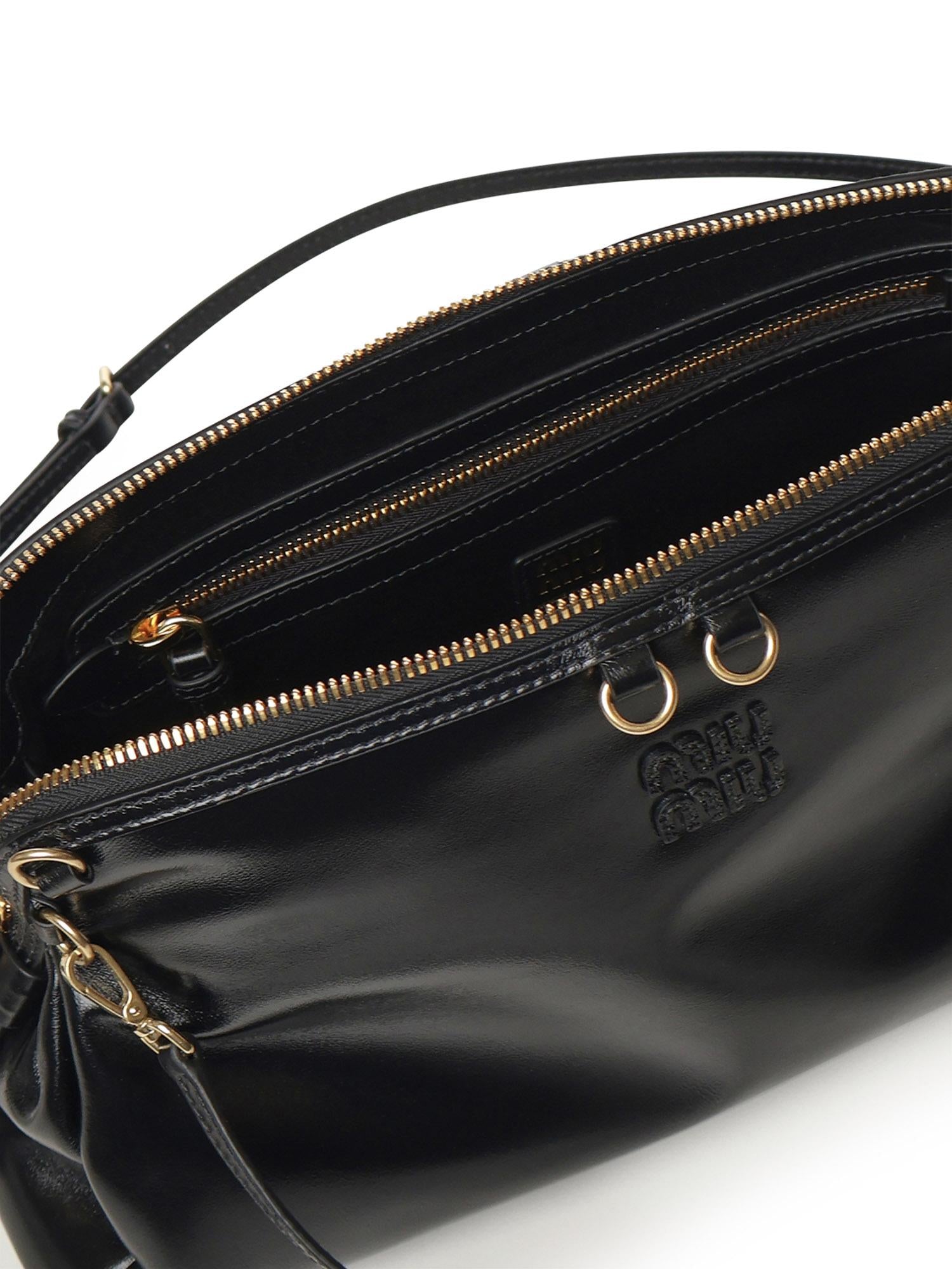 Pochette in pelle con logo 5BF129 2IEOF0002 MIU MIU
