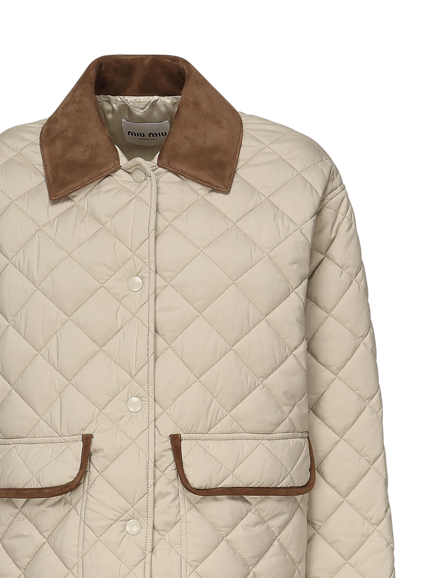 Giubbotto trapuntato con finiture a contrasto<BR/><BR/> ML1311 17OOF0036 MIU MIU