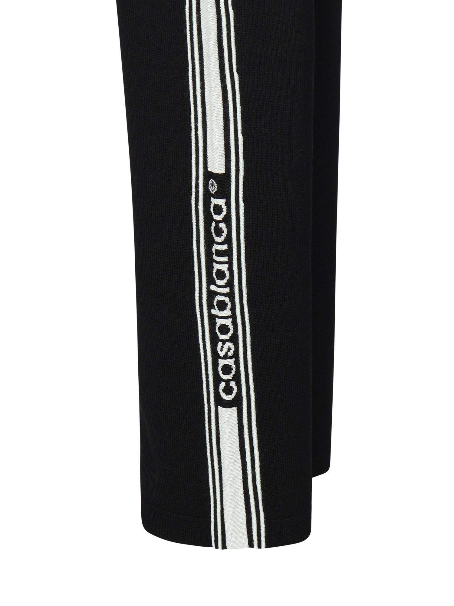 Pantaloni in lana con logo<BR/> MPF25KW101201 CASABLANCA