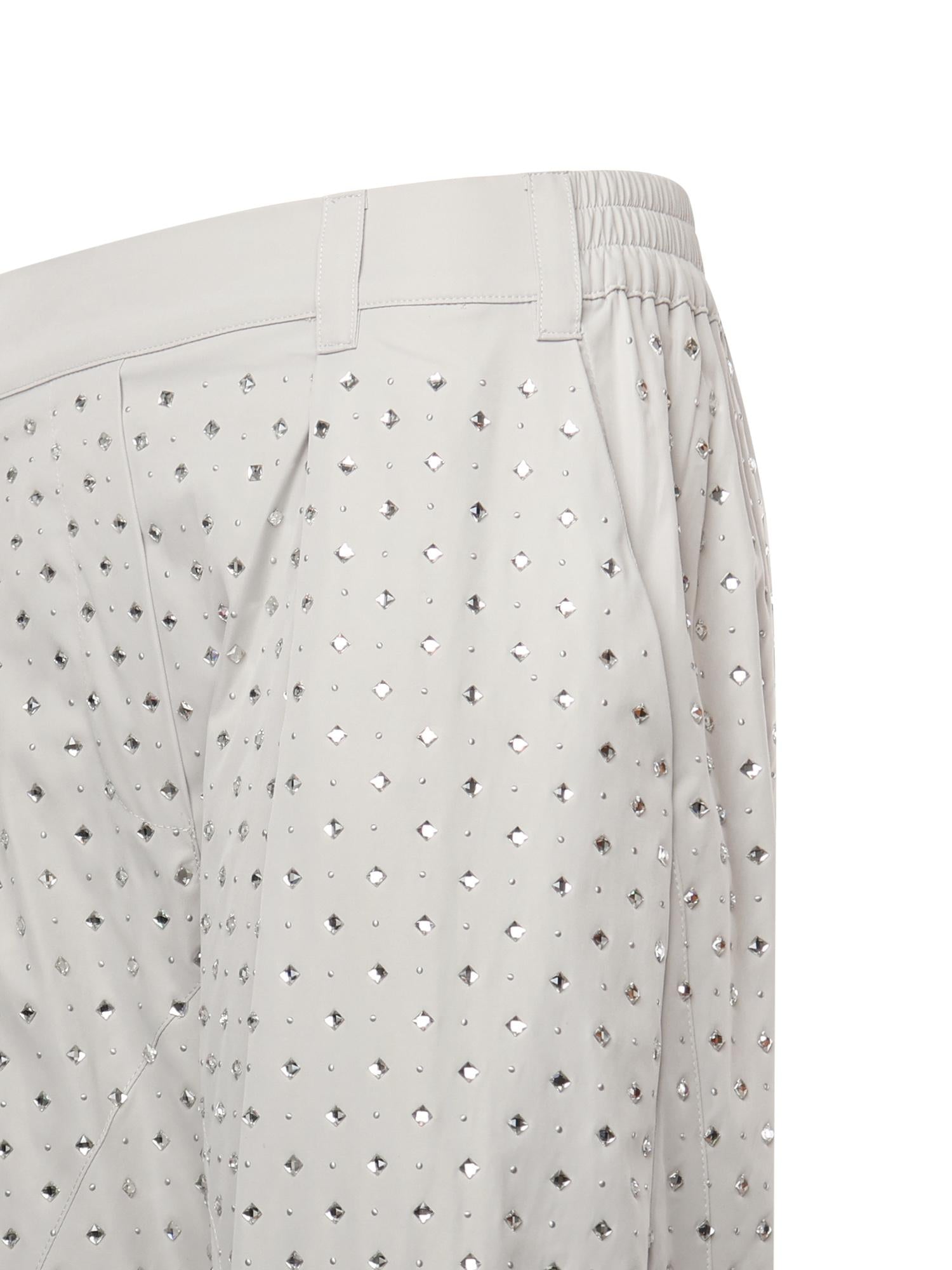 Pantaloni con strass e borchie 105984 A2XXK14 PINKO