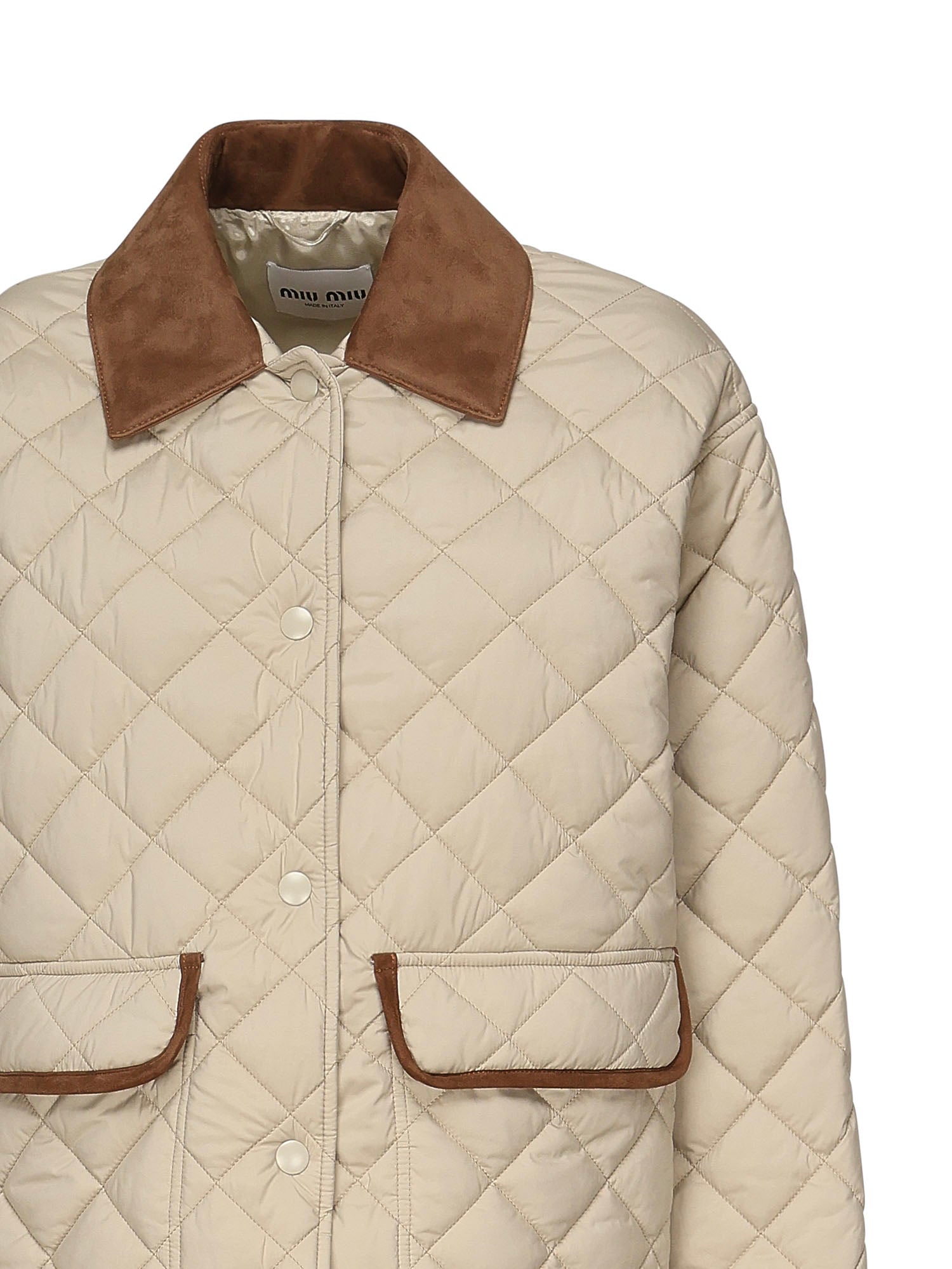 Giubbotto trapuntato con finiture a contrasto<BR/><BR/> ML1311 17OOF0036 MIU MIU 