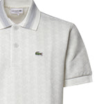 Polo in jacquard con monogramma DH1417 4IW LACOSTE 