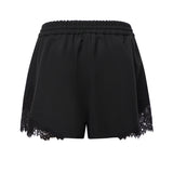Shorts fluidi con inserto in pizzo 107584 A3KEZ99 PINKO 