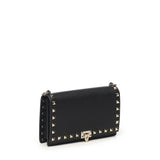 Mini bag con catena Rockstud in vitello granato 8W2P0Y59 VSH0NO VALENTINO GARAVANI 