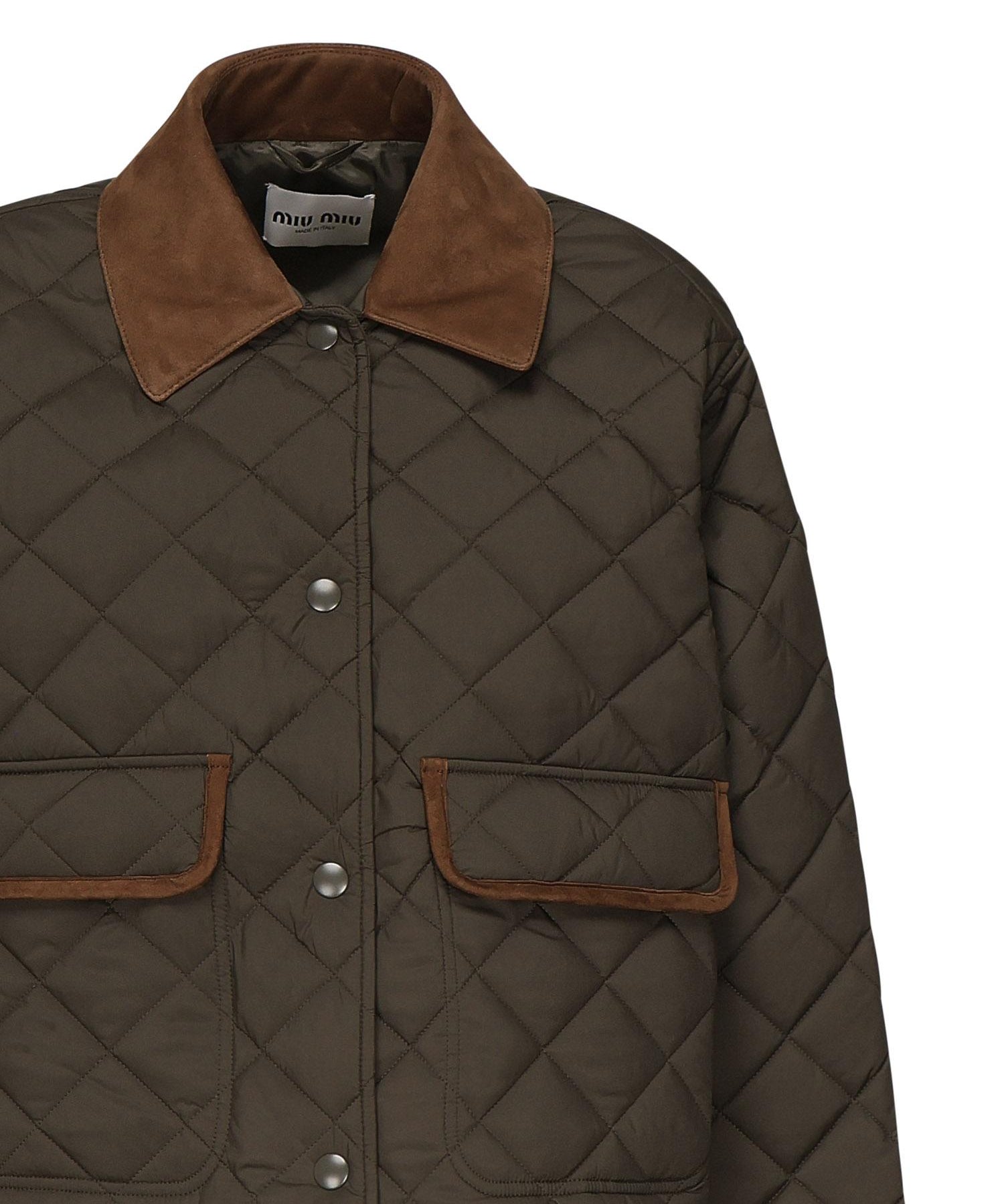 Giubbotto trapuntato con finiture a contrasto<BR/> ML1310 17OOF0161 MIU MIU 