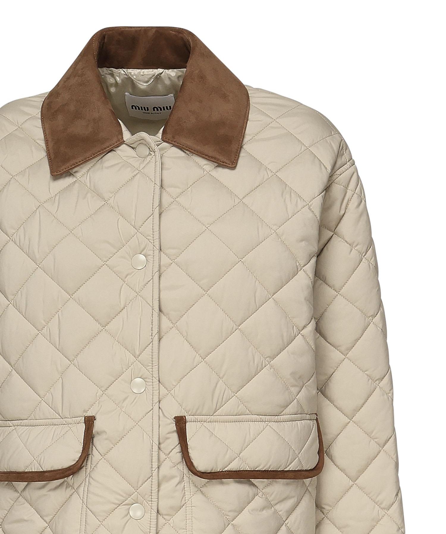 Giubbotto trapuntato con finiture a contrasto<BR/><BR/> ML1311 17OOF0036 MIU MIU 