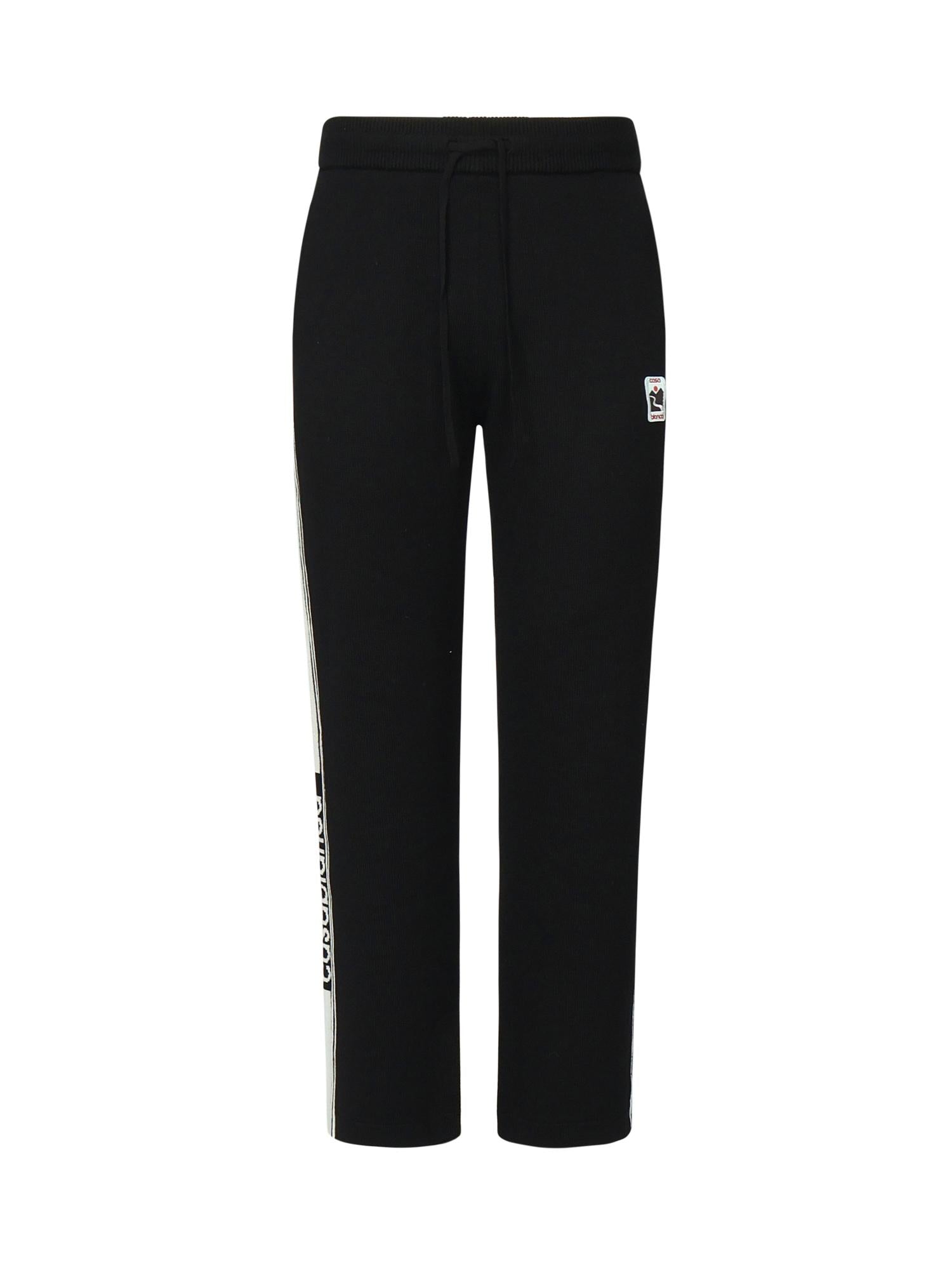 Pantaloni in lana con logo<BR/> MPF25KW101201  CASABLANCA 