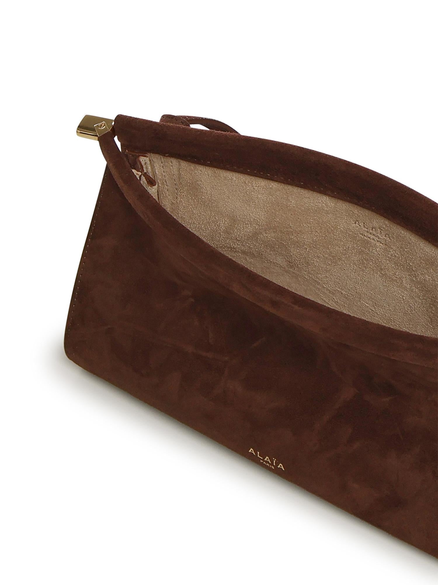 Borsa Le Click East West piccola in pelle scamosciata AA1S01426CA328 743 ALAIA 