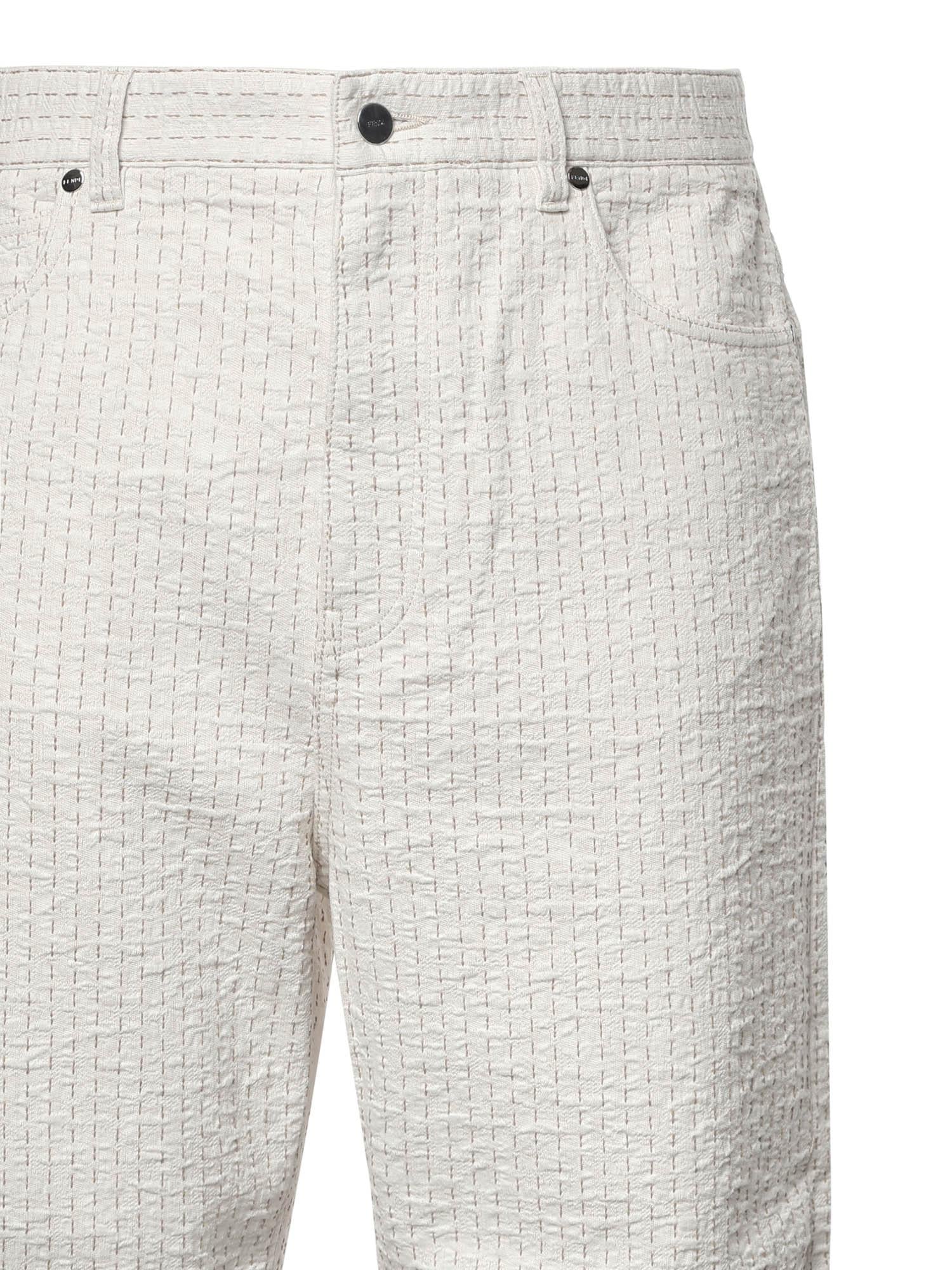 Jeans in denim con impunture FLP345 AWMLF08QQ FENDI 