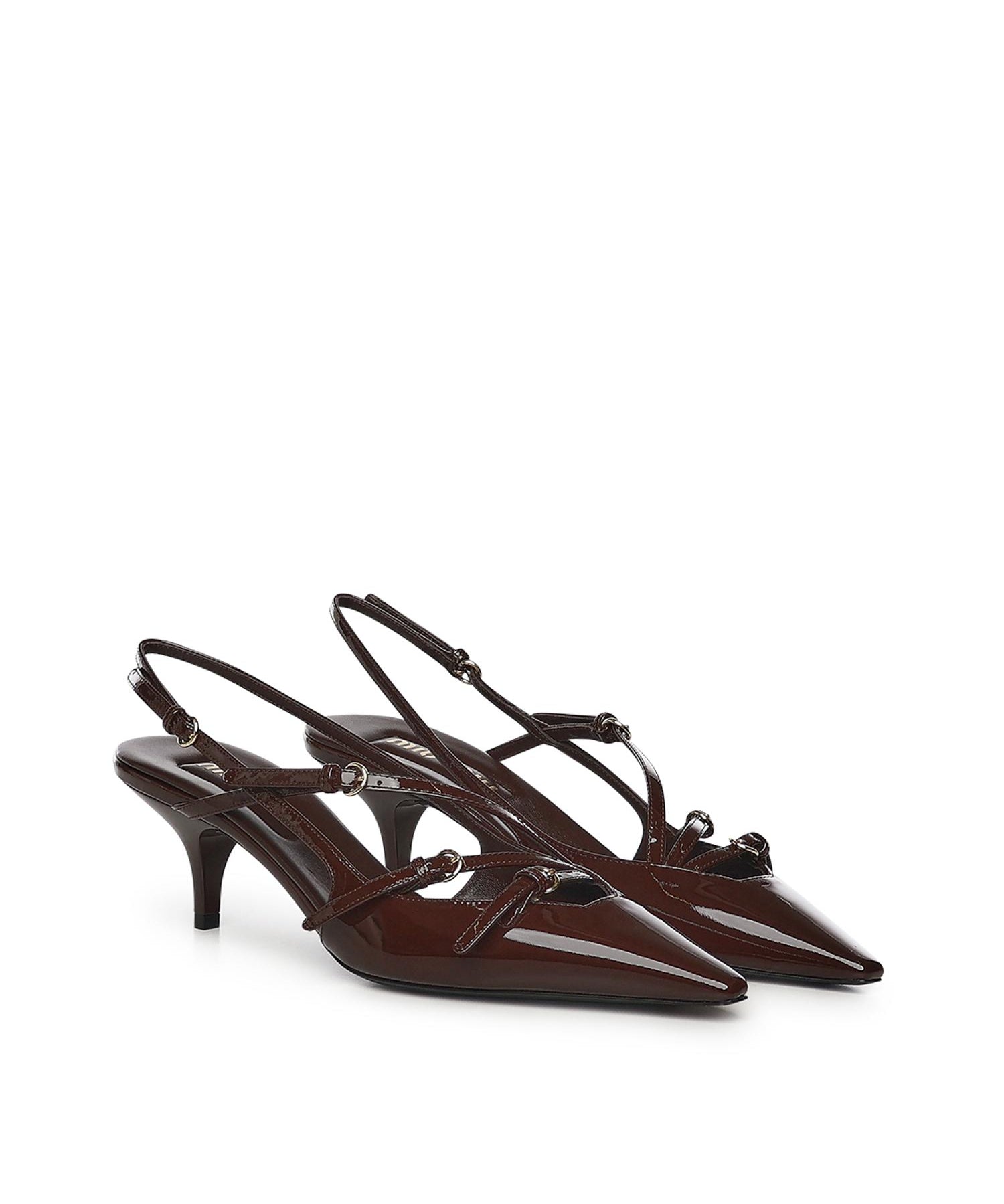 Décolleté slingback in pelle con fibbie 5I013E 069F0324 MIU MIU 