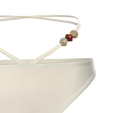 Slip bikini con cinturini e perline 618426  MAGDA BUTRYM 
