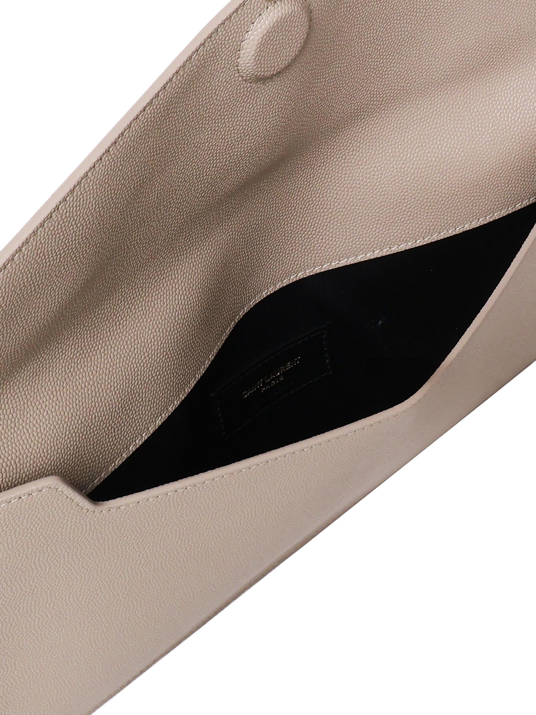 Pochette Uptown in pelle goffrata grain de poudre<BR/> 565739 1GF0J2721 SAINT LAURENT 