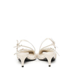 Décolleté slingback in vernice con fibbie 5I013E 69F0304 MIU MIU 